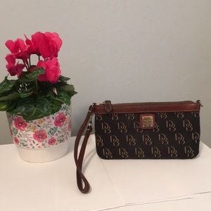 Dooney & Bourke Wristlet in good condition.